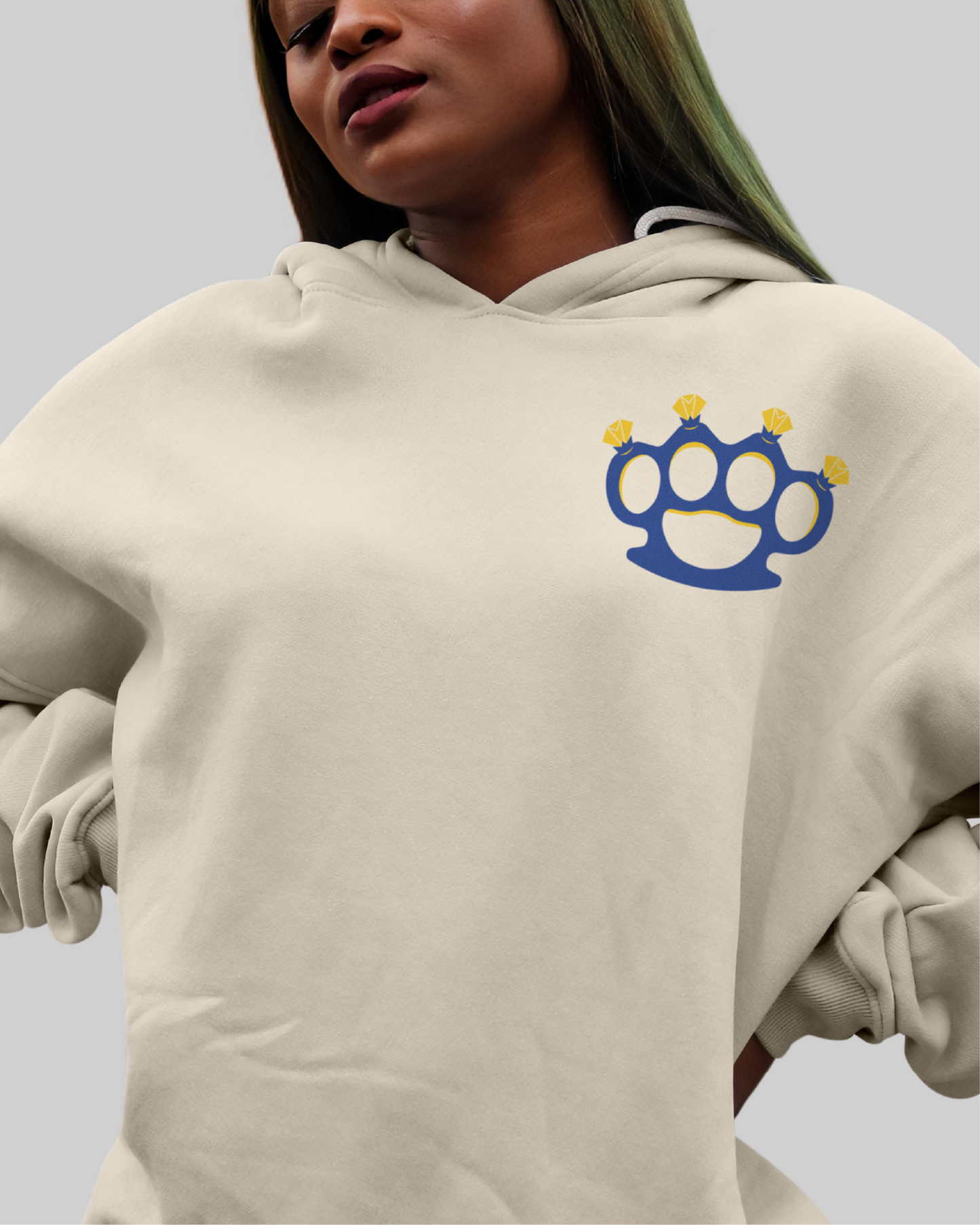 Beauty With Purpose: Sand Hoodie With Blue Brass Knuckles