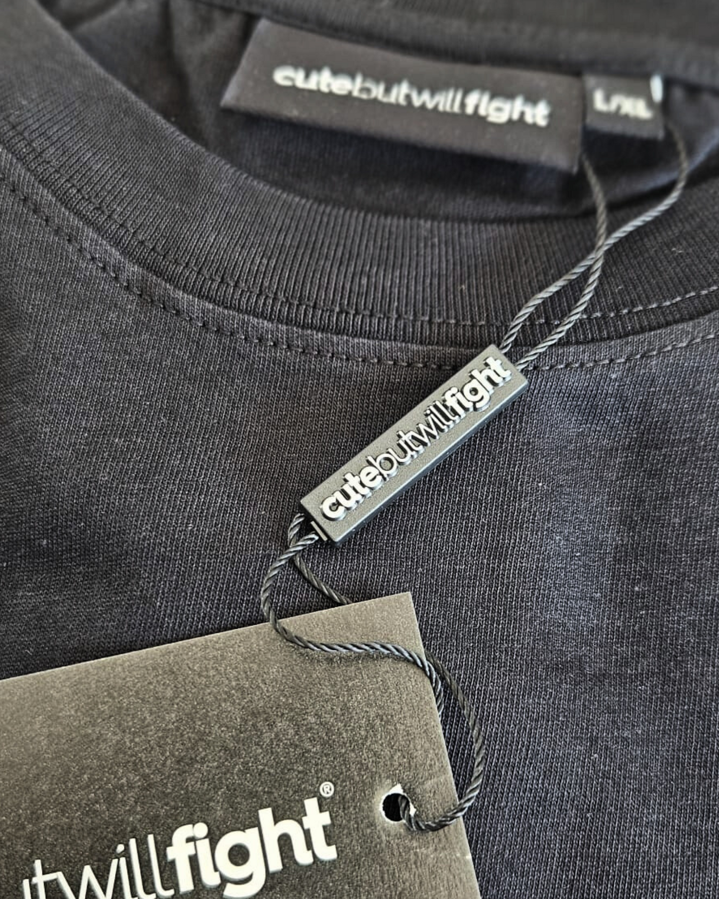 Advocating For Action: Black T-Shirt With Red Grenade