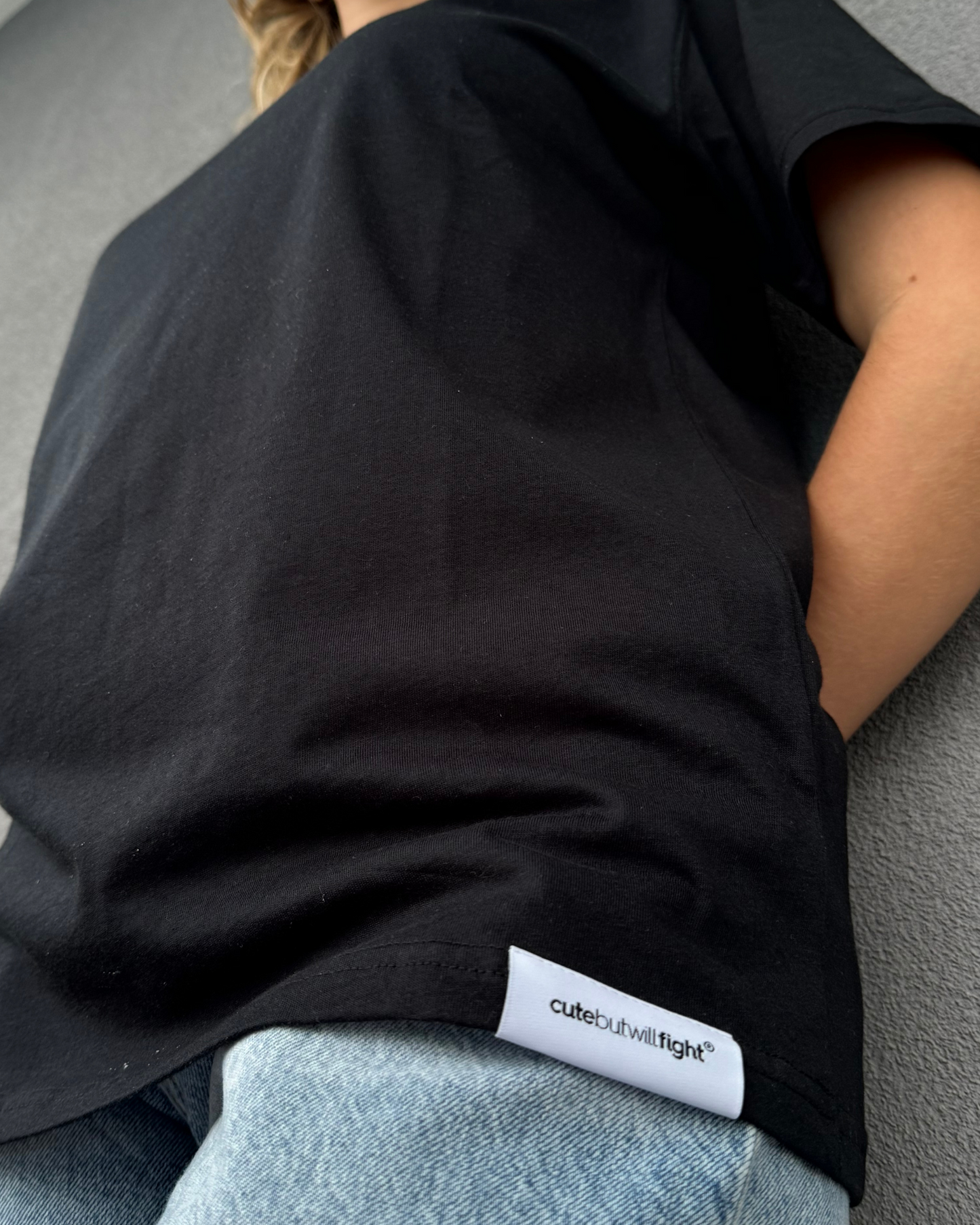 Advocating For Action: Black T-Shirt With Red Grenade
