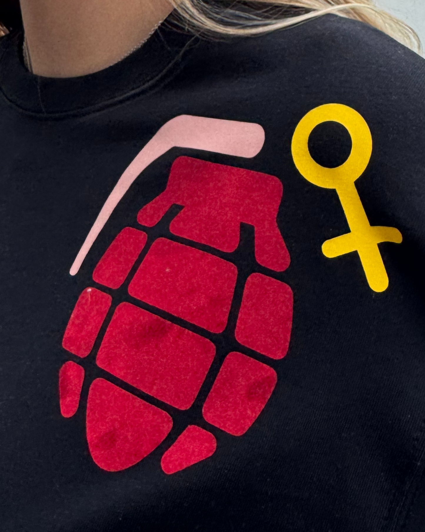 Advocating For Action: Black T-Shirt With Red Grenade