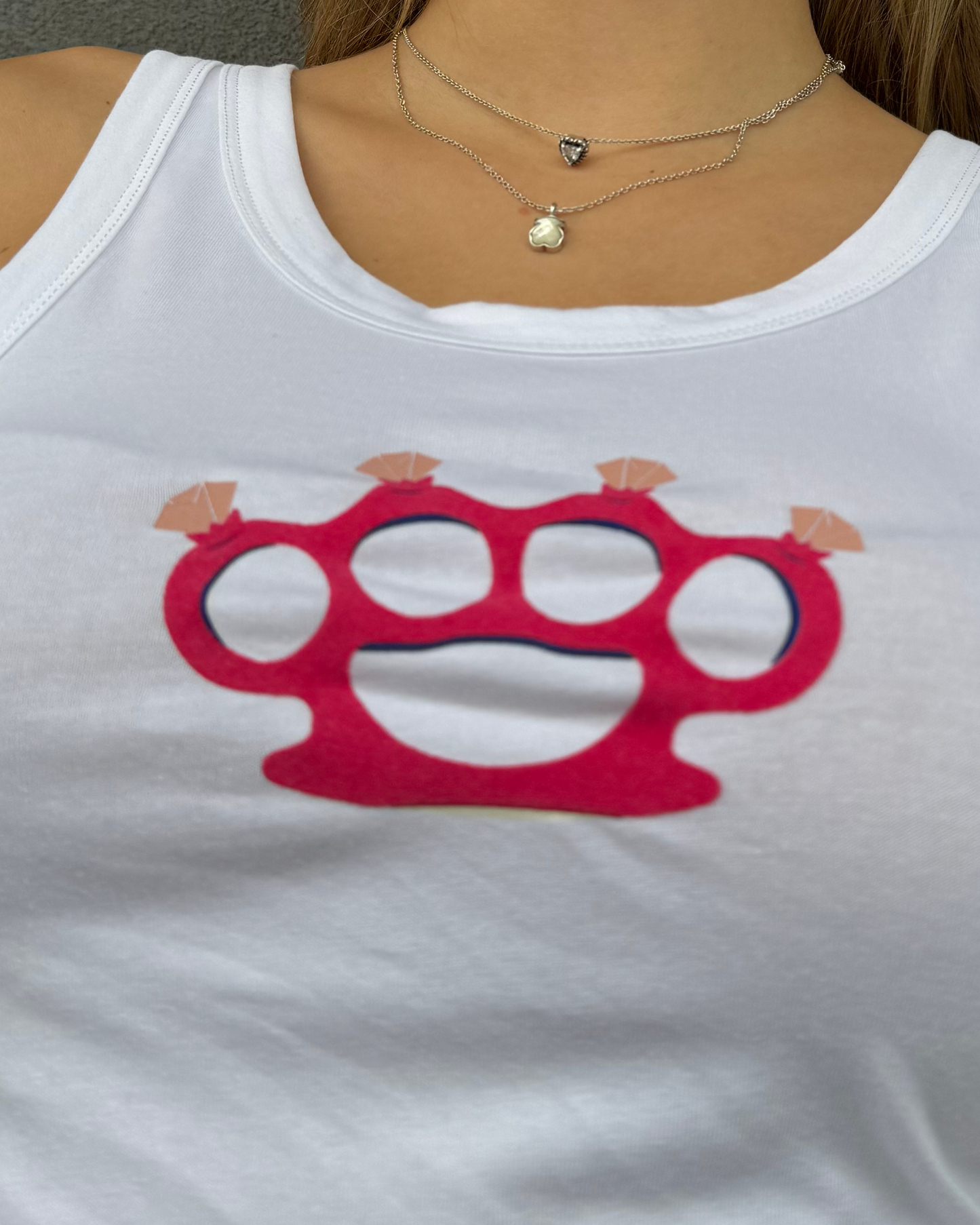Beauty with Purpose: White Tank Top with Red Brass Knuckles